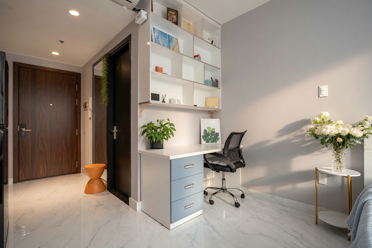 RiverGate studio workspace with desk, shelving and clean entry area